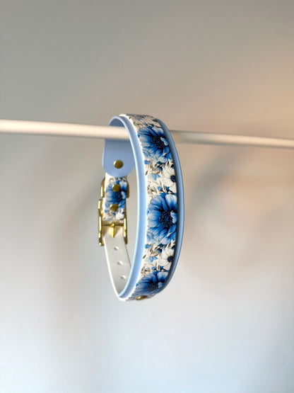 Collier fleurs bleues 25/38mm